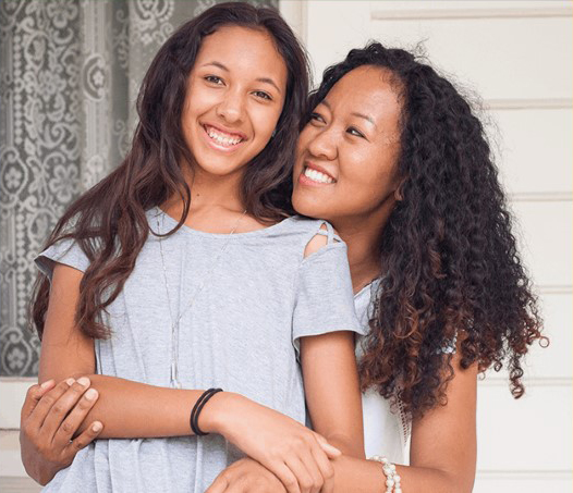 Doing your own due diligence can save you from making lifechanging mistakes. A happy mother and daughter on a front porch.