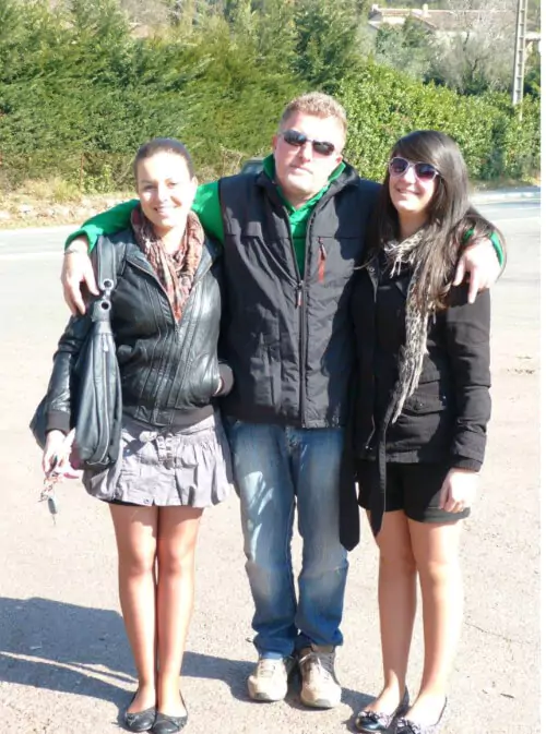 Family standing outside happy about saving their Point Pleasant home from foreclosure.